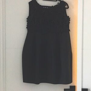 Italian made black dress with intricate bodice. Beautifully designed. Loose fit